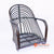 BNTC001-22 BLACK RATTAN GAPED AND ARMED LOW CHAIR