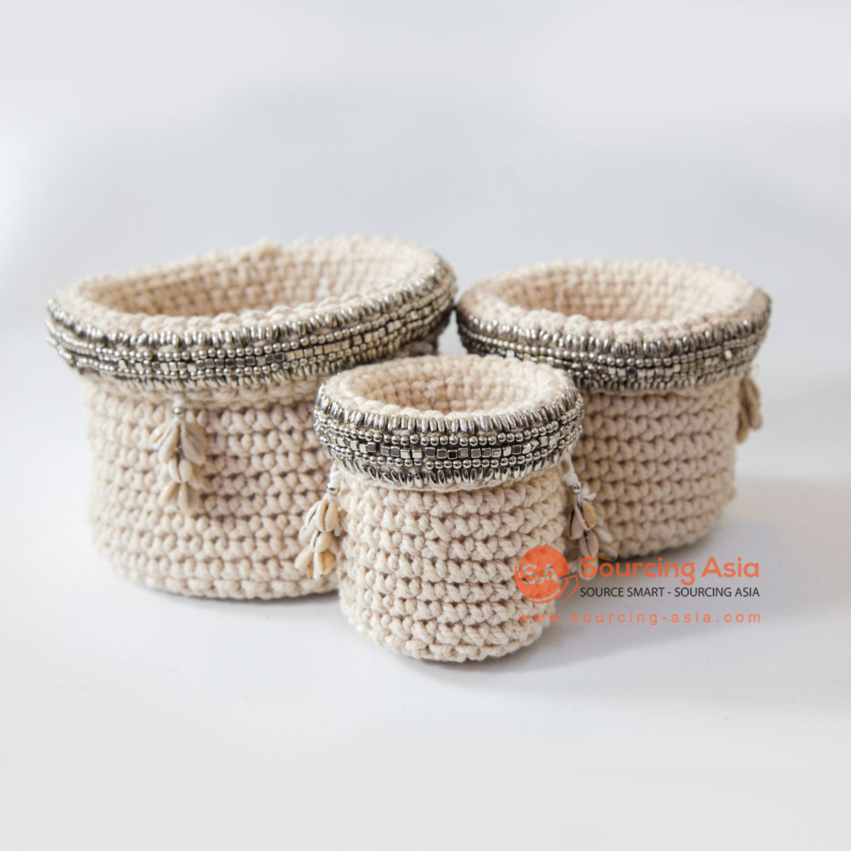 DHL124 SET OF THREE CREAM MACRAME AND WHITE SHELL SMALL BASKETS