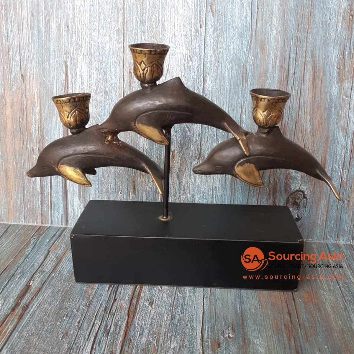 GB135 THREE BRASS DOLPHINS CANDLE HOLDER WITH BLACK STAND