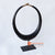 KNTC022 BLACK WOODEN NIAS MENTAWI NECKLACE ON STAND DECORATION