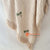 MAC354 NATURAL RAW COTTON THROW WITH PALM EMBROIDERY, LACE, AND FRINGE