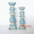 MANC065 SET OF TWO BLUE WOODEN CURVED CANDLE HOLDERS