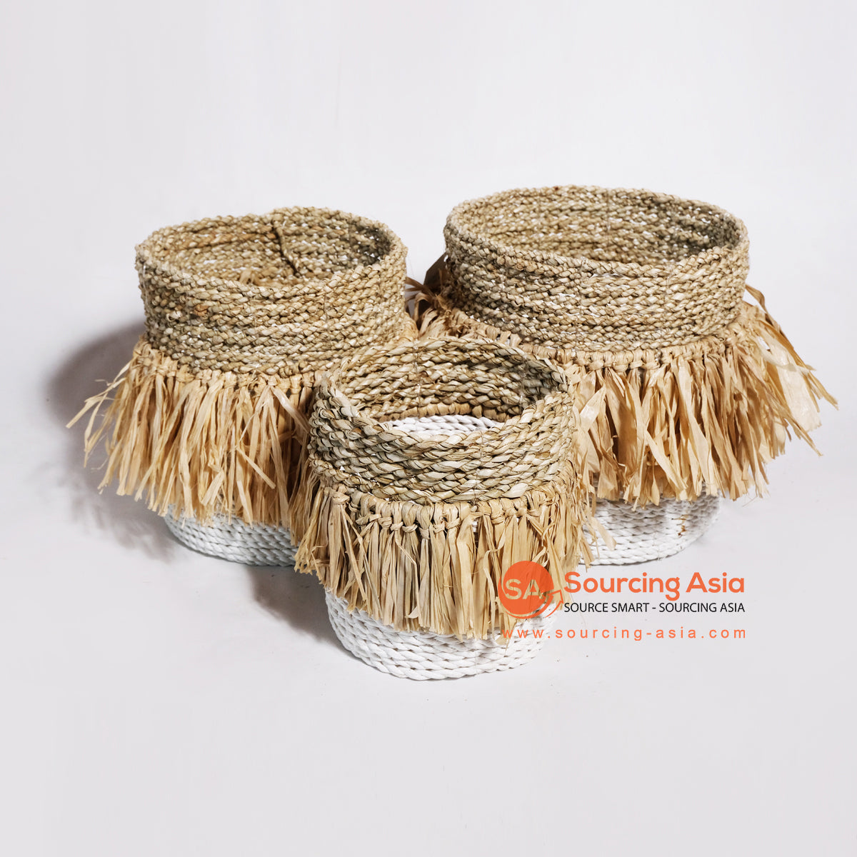 MRC034 SET OF THREE NATURAL SEAGRASS AND WHITE RAFFIA BASKETS WITH NATURAL RAFFIA FRINGE