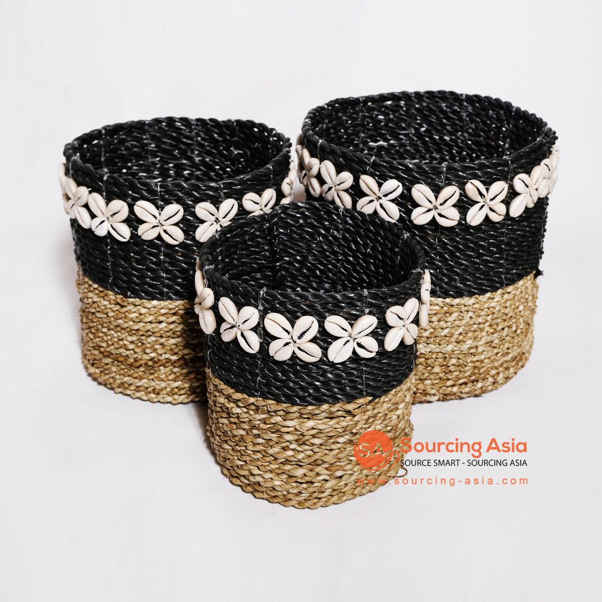 MRC066 SET OF THREE BROWN SEAGRASS AND BLACK RAFFIA BASKETS WITH SHELL DECORATION