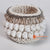 ROB014 NATURAL SHELL MACRAME BOTTLE HOLDER WITH BRONZE BEADING