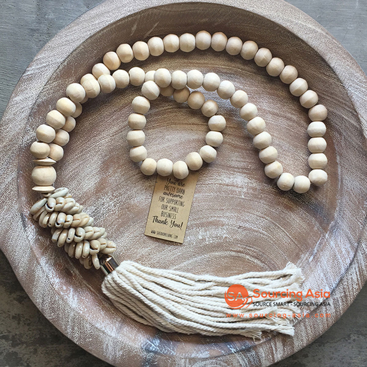 Wooden bead necklace with on sale tassel